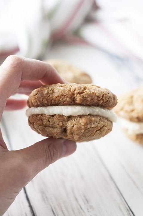 This easy copy-cat recipe for Little Debbie's Homemade Oatmeal Creme Pies are soft, thick, and chewy, with a creamy center filling and taste even better than the store-bought cookie pies! Perfect cookie recipe for a bake sale or dessert idea for Mother's Day!