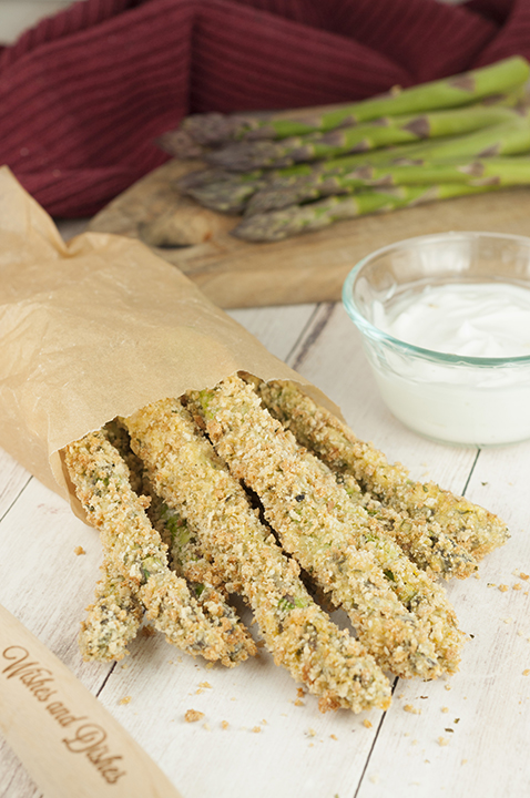 Crispy Baked Parmesan Asparagus Fries with Creamy Lemon Dipping Sauce is a great recipe for a summer BBQ, summer side dish idea, or a picnic - no need for a deep fryer with this recipe!
