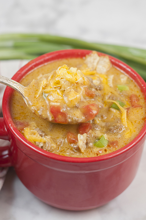 Your favorite nacho flavors and toppings turned into an easy soup recipe loaded with beef and cheese. This Easy Beef Nacho Soup is great for a quick lunch or fast dinner and the whole family will ask for seconds!