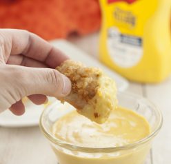 Extremely easy smooth and creamy 4 ingredient Honey Mustard Dipping Sauce recipe you can dip pretzels or French fries in, spread on grilled chicken, potatoes, mini meatballs, and more!