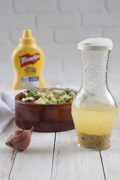 Simple Mustard Shallot Vinaigrette recipe that would go perfectly on any salad or pasta salad!