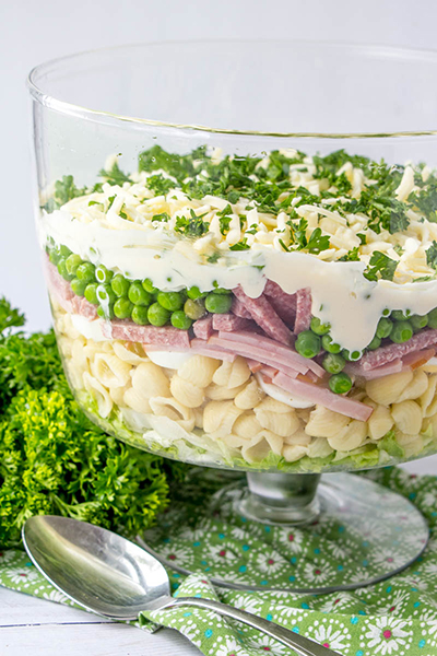 Gorgeous Make-Ahead Eight Layer Salad recipe for the most foolproof, colorful salad great for entertaining, potlucks, or summer picnic side dish idea! It is so easy and you can make it ahead of time for a party or Father's Day BBQ!