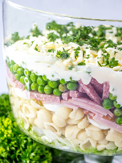 Gorgeous Make-Ahead Eight Layer Salad recipe for the most foolproof, colorful salad great for entertaining, potlucks, or summer picnic side dish idea! It is so easy and you can make it ahead of time.
