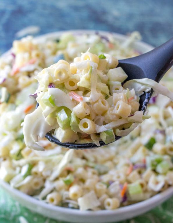 Easy Macaroni Coleslaw Salad is packed with vegetables and pasta and a beautiful combination of your two favorite summer side dishes: coleslaw and macaroni salad! This is a great, easy recipe to take to a potluck or BBQ.