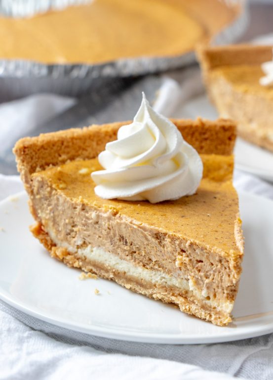 Rich and creamy Double Layer Pumpkin Cheesecake recipe is a fall classic, and great alternative to pumpkin pie, especially for those cheesecake fans out there! This is the perfect holiday dessert!