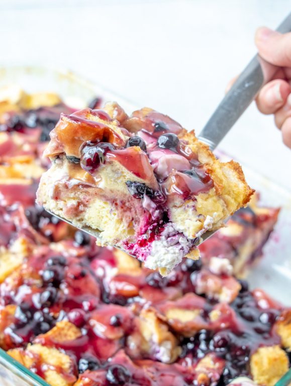 Simple, classic Overnight Blueberry French Toast Casserole is the perfect breakfast or brunch dish that makes for a beautiful presentation and tastes as good as it looks! This is great for an easy potluck recipe or a Christmas morning breakfast idea!