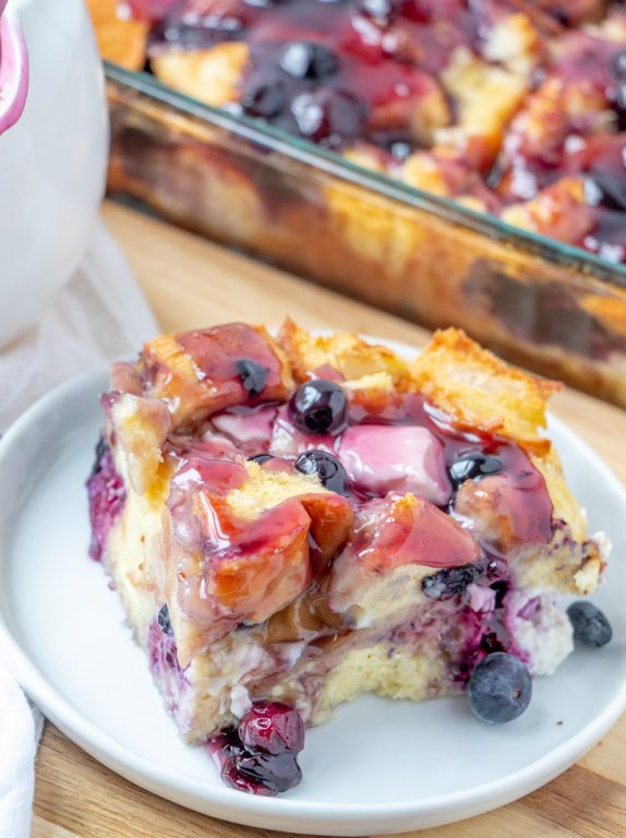 Overnight Blueberry French Toast Casserole is the perfect breakfast or brunch dish that makes for a beautiful presentation and tastes as good as it looks! This is great for an easy potluck recipe or a holiday breakfast idea!