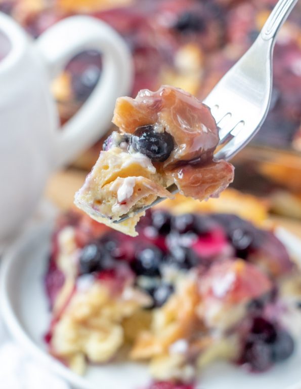 Easy, classic Overnight Blueberry French Toast Casserole is the perfect breakfast or brunch dish that makes for a beautiful presentation and tastes as good as it looks! This is great for an easy potluck recipe or a Christmas morning breakfast idea!