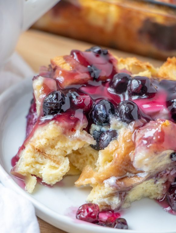 Easy, classic Overnight Blueberry French Toast Casserole is the perfect breakfast or brunch dish that makes for a beautiful presentation and tastes as good as it looks! This is great for an easy potluck recipe, dish to pass at a shower, or a holiday brunch or breakfast idea!