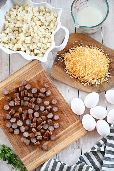 Ingredients prepped for Cheesy Potato Sausage Breakfast Casserole is an easy breakfast or brunch casserole recipe you can throw together on a weekend that the whole family will love!