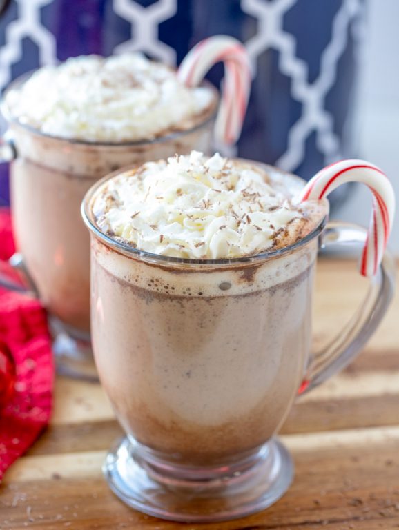 Slow Cooker Peppermint Mochas: a great hot drink recipe to serve at a holiday or winter party & an absolute must-have for this time of year! Throw it all in your crock pot & it's ready in just 2 hours!