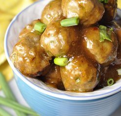 Baked Orange Meatballs dinner recipe that is also perfect on an appetizer buffet or as a little game day snack with a sweet Asian sauce to nibble on! Great for a crowd!