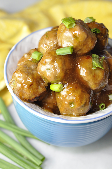 Baked Orange Meatballs dinner recipe that is also perfect on an appetizer buffet or as a little game day snack with a sweet Asian sauce to nibble on! Great for a crowd!