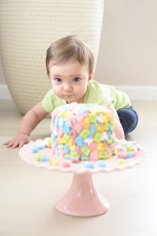 Baby going after the lucky charms layer cake