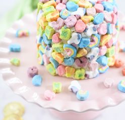Easy Lucky Charms Layer Cake is such a fun dessert recipe that kids can help make for Saint Patrick's Day! Moist vanilla cake with vanilla buttercream frosting is a versatile recipe you can use for any birthday or special occasion.