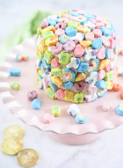 Easy Lucky Charms Layer Cake is such a fun dessert recipe that kids can help make for Saint Patrick's Day! Moist vanilla cake with vanilla buttercream frosting is a versatile recipe you can use for any birthday or special occasion.