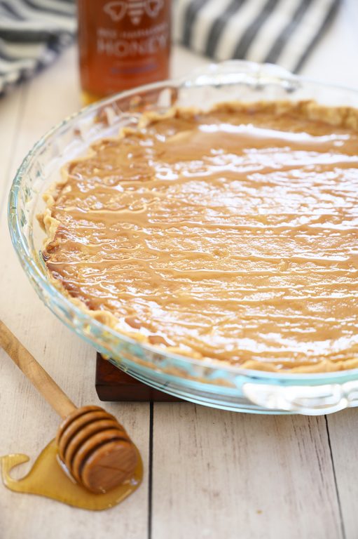Beyond simple Salted Honey Pie recipe is an inviting sweet and salty flavored dessert with an irresistible custard filling, perfect flakey pie crust, and is absolutely delectable! This would be a great Easter dessert idea.