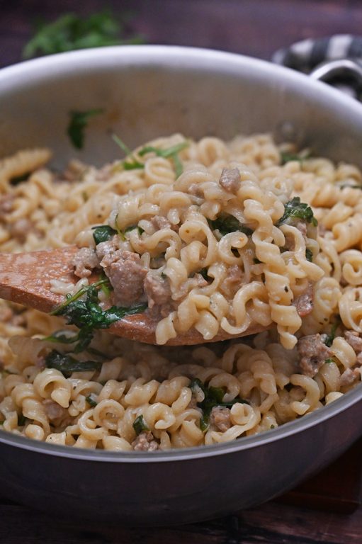 Creamy One Pot Hamburger Stroganoff recipe is an easy weeknight meal with ground beef and pasta that is on the family table in less than 30 minutes!