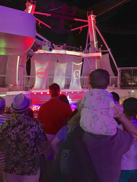 Watching the aqua show on board Royal Caribbean Symphony of the Seas cruise. 