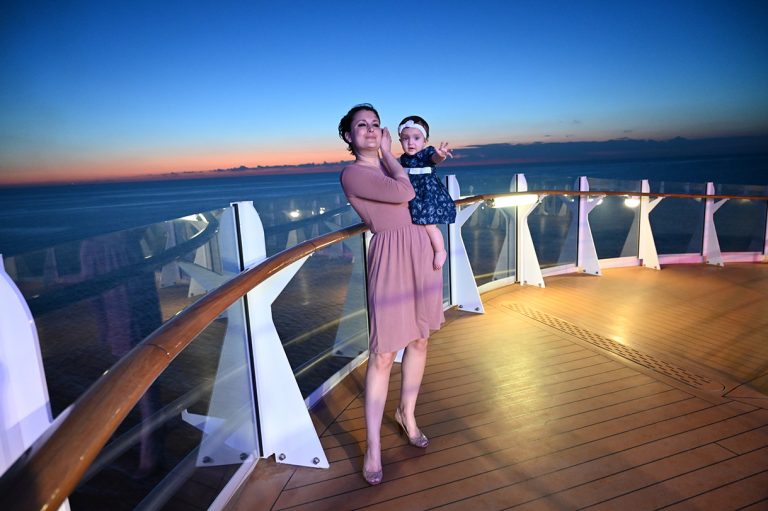 Walking around at night during Royal Caribbean Symphony of the Seas caribbean family cruise.