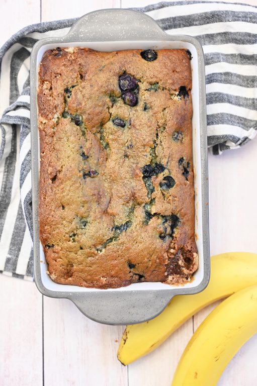 Golden, moist Blueberry Banana Bread recipe is the perfect combination for a snack, brunch or breakfast! You'll never need another banana bread recipe ever again!