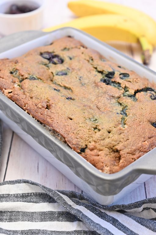 My favorite golden, moist Blueberry Banana Bread recipe is the perfect combination for a snack, brunch or breakfast! You will never need another banana bread recipe again!