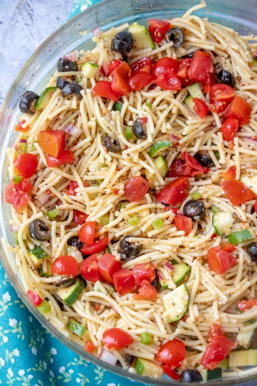 Potluck or picnic easy side dish, California Spaghetti Salad has diverse textures & is a great summer salad recipe that tastes even better the next day!
