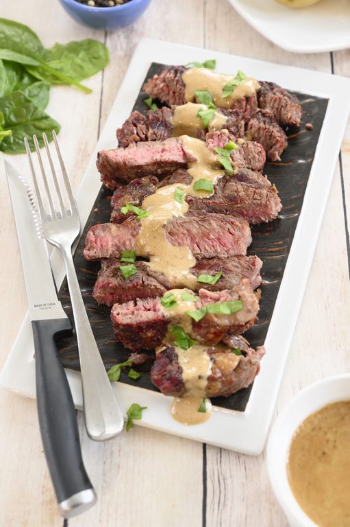 Simple Grilled Ribeye Steak with Onion Blue Cheese Sauce recipe is absolutely delicious and the perfect choice for a summer cookout! No need to go to your local expensive steakhouse when you can make it easily right at home this summer!