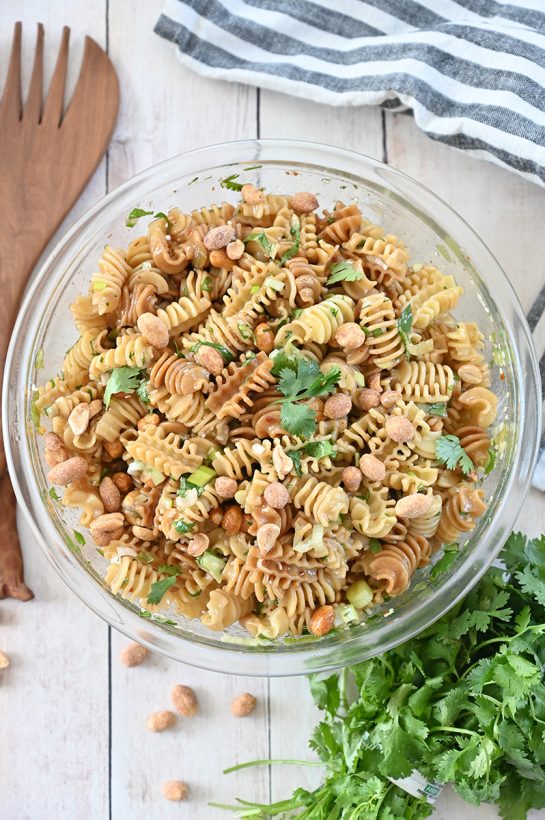 Amazing and easy Sesame Pasta Salad recipe: pasta tossed in a sesame oil and soy sauce-based dressing is a refreshing, Asian-inspired side dish perfect for summer picnics, BBQ, or potlucks!