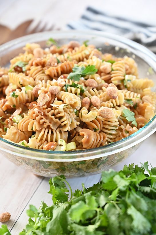 Tasty and easy Sesame Pasta Salad recipe: pasta tossed in a sesame oil and soy sauce-based dressing is a refreshing, Asian-inspired side dish perfect for summer picnics, BBQ, or potlucks!