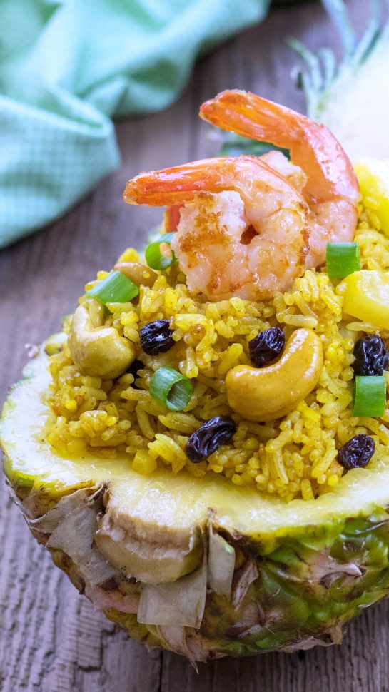 Forget about the takeout this week and make this easy Pineapple Shrimp Fried Rice. It is sweet and savory and an easy Asian recipe to make at home!