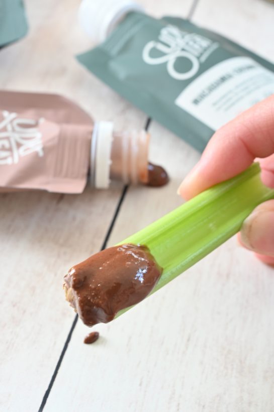Gluten-free, vegan mason Jar Pretzel, Celery, Almond Butter Snack with SuperFat nut butter is the perfect healthy on-the-go snack loaded with protein to give you a quick boost of energy any time of day!