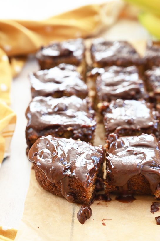 Photo of chocolate peanut butter ganache on top of cut up banana bread brownies.