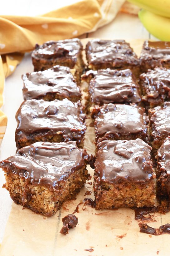 Easy Banana Bread Brownies with Chocolate Peanut Butter Ganache cut up and ready to serve.