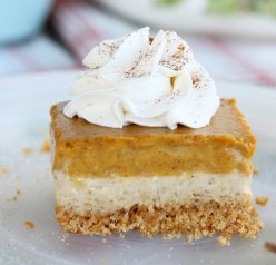 This amazing pumpkin cheesecake bars recipe has buttery graham cracker crust, a cream cheese layer and a pumpkin cream cheese layer! A great fall dessert idea!