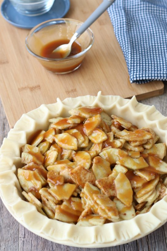 What would a caramel apple pie be without the caramel?! Here we see it being added on top of the apple mixture.