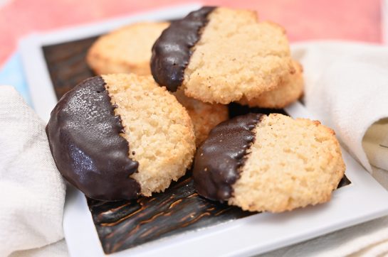 Easy Chocolate Dipped Coconut Macaroons have a sweet and chewy texture, dipped in sweet melted chocolate for the ultimate holiday dessert experience. This recipe is so easy to make!