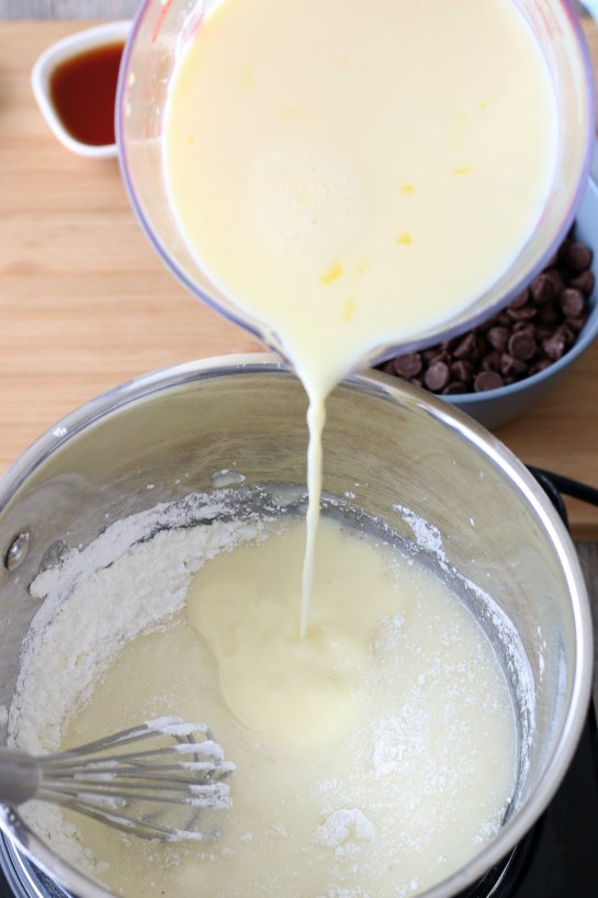 Image shows wet ingredients being mixed into the old fashioned chocolate pie batter.