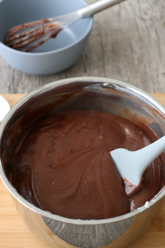 The rich homemade chocolate pie filling is very nearly ready!