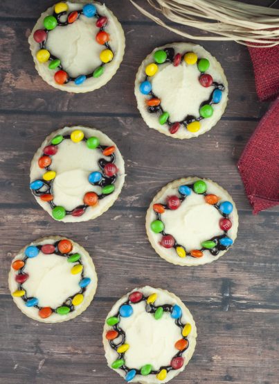 Christmas Light Bulb Cookies recipe are a fun treat to make with your kids for the holidays! These will become a holiday favorite and are almost too pretty to eat.