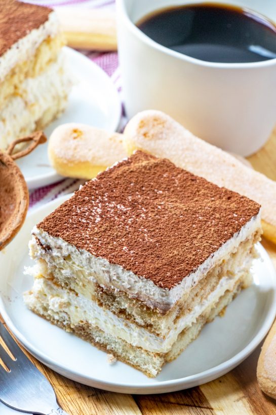 Traditional Grandma’s Tiramisu is an authentic classic coffee-flavored Italian dessert idea for the Thanksgiving, Easter and Christmas. This is one of my favorite desserts and is actually pretty simple to bake!