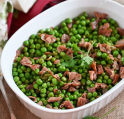 Peas with Prosciutto is the best 20 minute side dish for a weeknight meal or a holiday feast! Peas are richly flavored by salty prosciutto as well as the pork's rendered fat. Delicious!