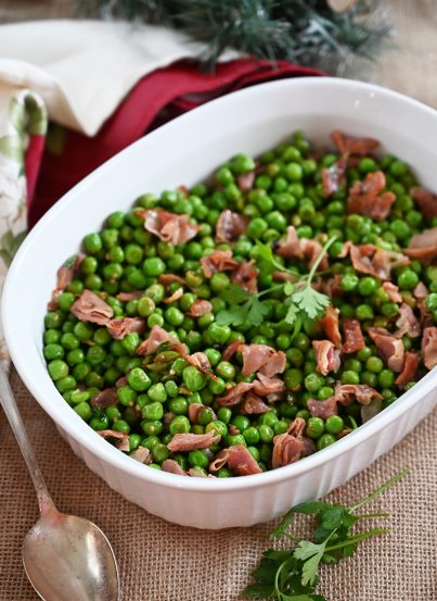 Peas with Prosciutto is the best 20 minute side dish for a weeknight meal or a holiday feast! Peas are richly flavored by salty prosciutto as well as the pork's rendered fat. Delicious!