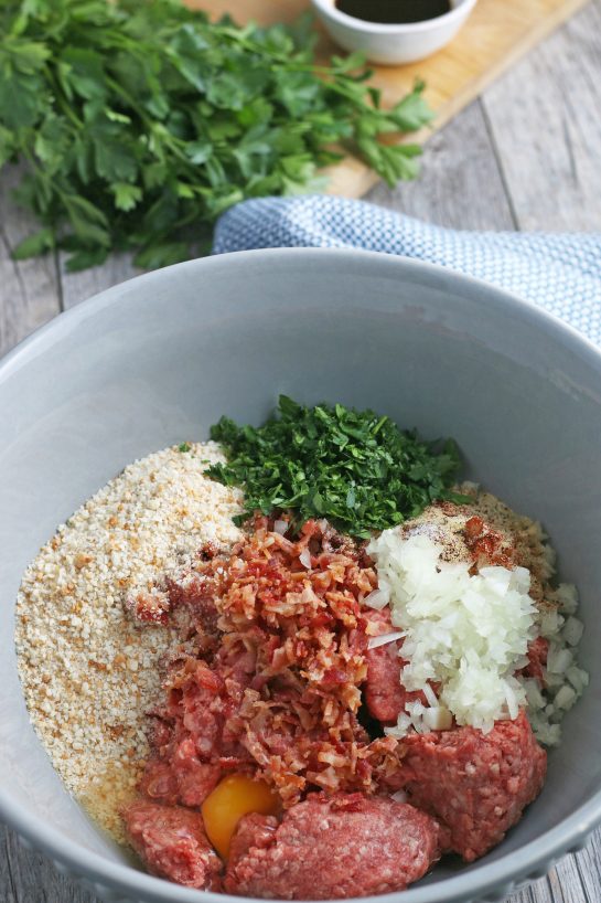 The first step for how to make meatballs is to combine all of our ingredients in a bowl!