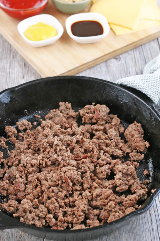 The first thing we need to do to make cheeseburger bites is fry up our meat!