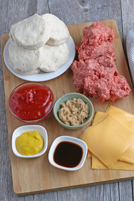 Here we see all the ingredients needed to make cheeseburger biscuit cups before we begin cooking.