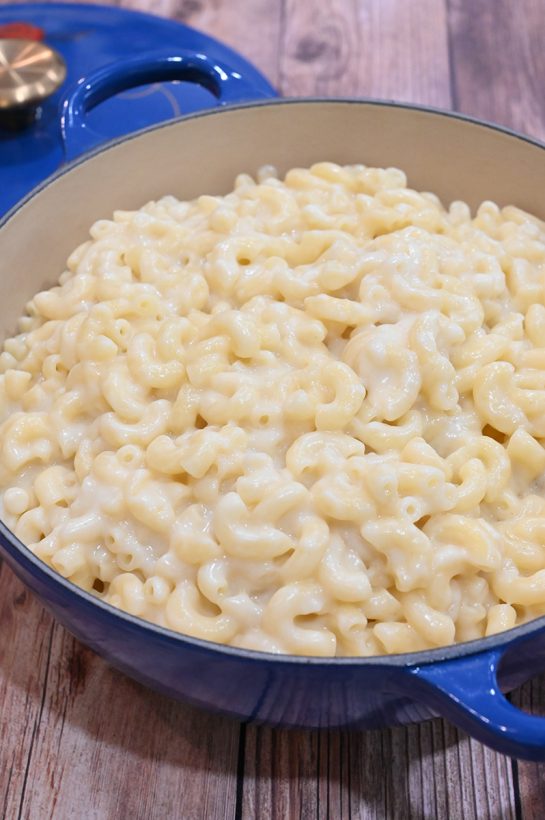 Easy, Stovetop Macaroni & Cheese with cheddar cheese recipe is a simple way to get dinner on the table when you're short on time. It can also be a great party appetizer or holiday potluck idea!