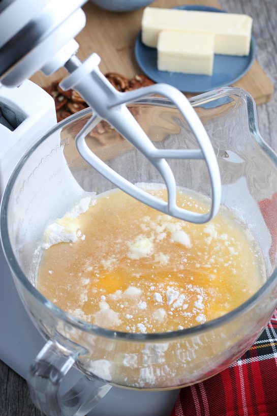 Making rum cake starts with the stand mixer and the wet ingredients.