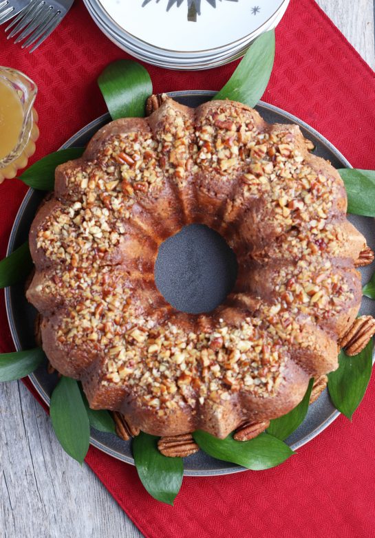 A top down shot of a finished rum cake ready to be served and enjoyed.