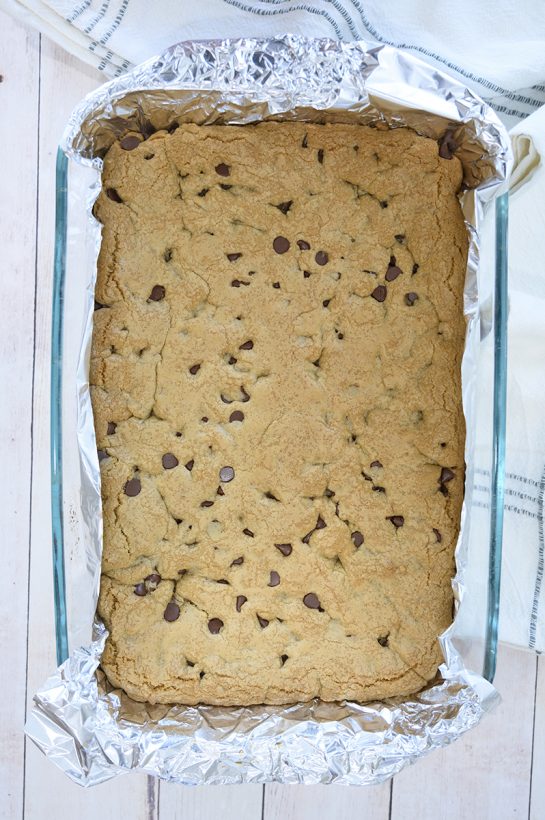 Easy Chewy Chocolate Chip Cookie Bars is a dessert recipe made without a mixer or chilling dough! 